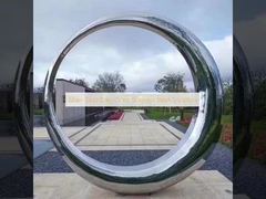 Escultura em aço inoxidável prateado dourado cinza